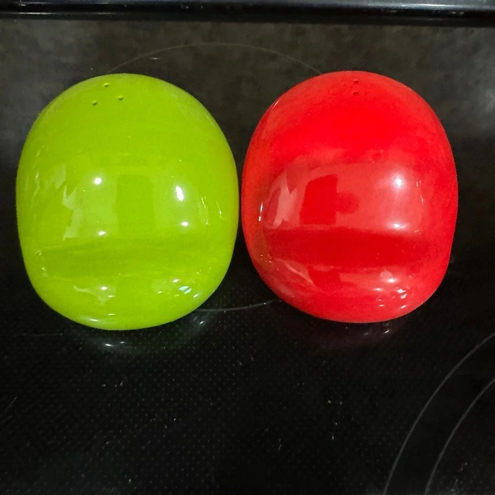 The Super Mario Bros. Salt & pepper shakers Mario & Luigi Hats set by Geek Fuel.